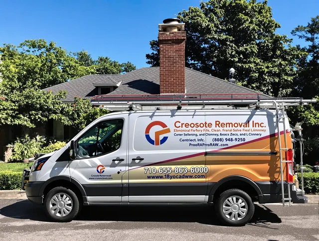 Upper Arlington Chimney Sweep technician removing creosote safely in Upper Arlington, OH