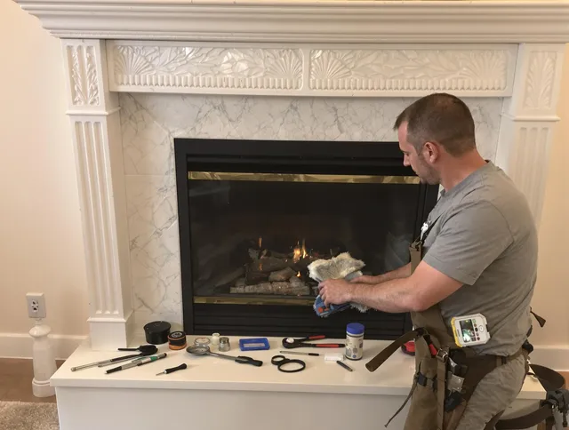 Upper Arlington Chimney Sweep performing fireplace maintenance in Upper Arlington, OH
